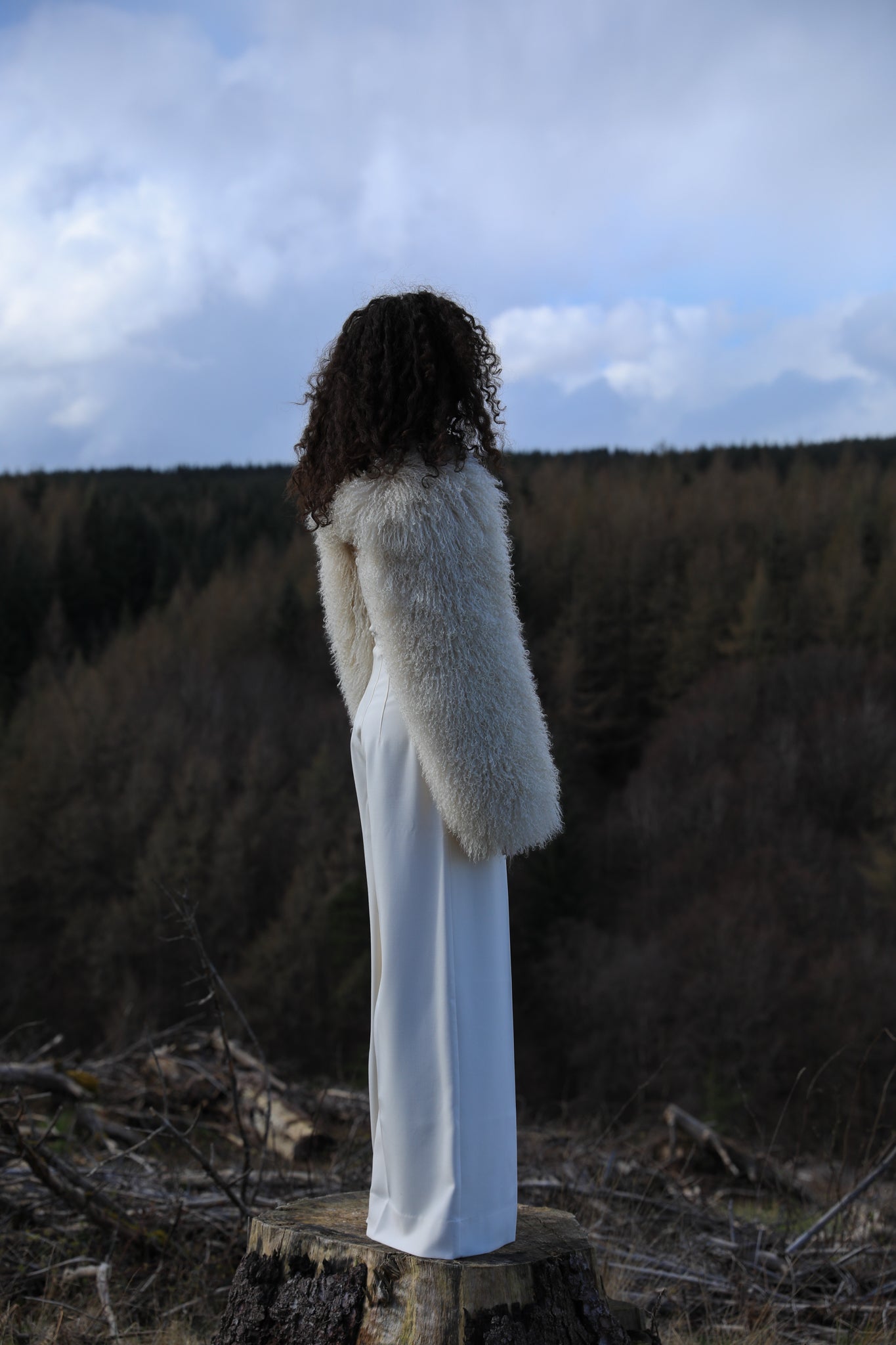 Mongolian shearling sleeves fastening around the neck — The Rosa