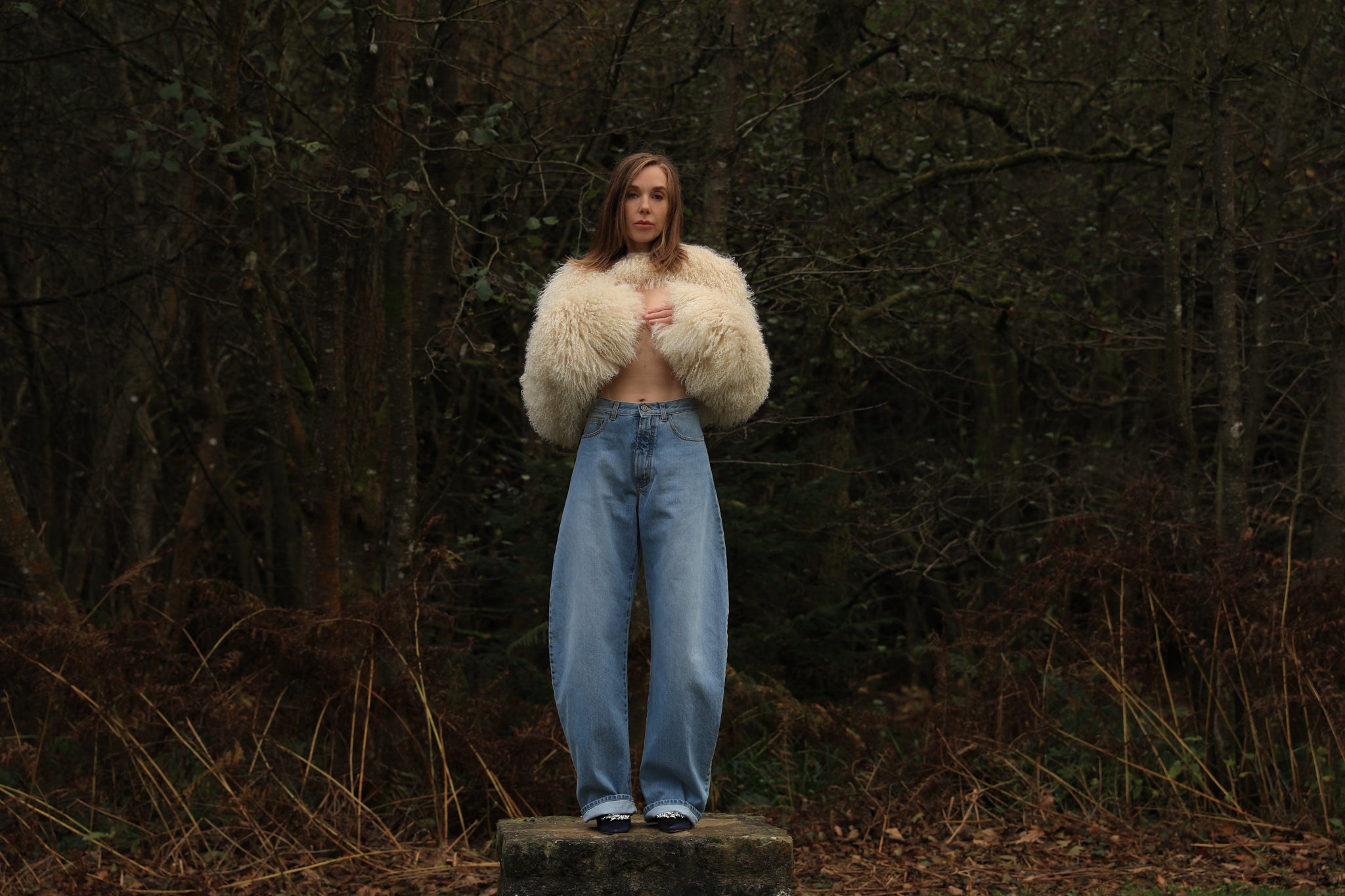 Mongolian shearling sleeves fastening around the neck — The Rosa