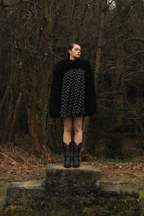  Mongolian shearling sleeves fastening around the neck — The Rosa